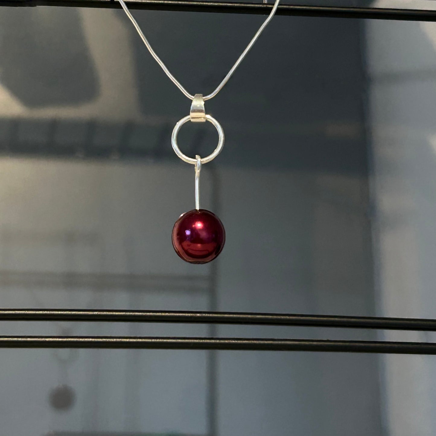Burgundy charm